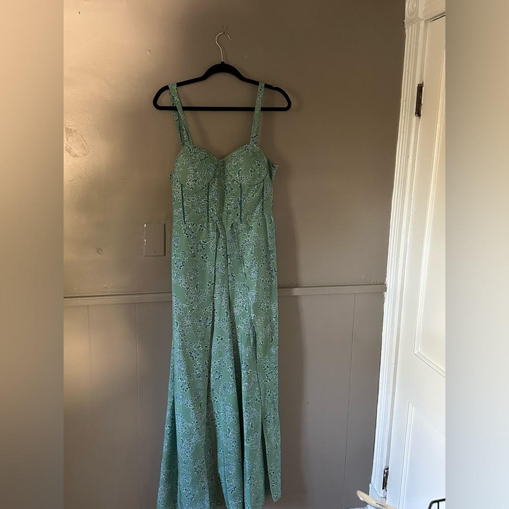 Green floral romper. New with tag.